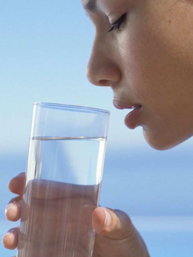 Young Woman Drinking Water