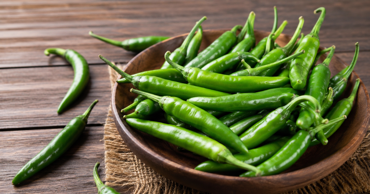 Green Chili Side Effects: एक दिन में कितनी हरी मिर्च खाना सही? ज्यादा सेवन से हो सकते हैं ये नुकसान