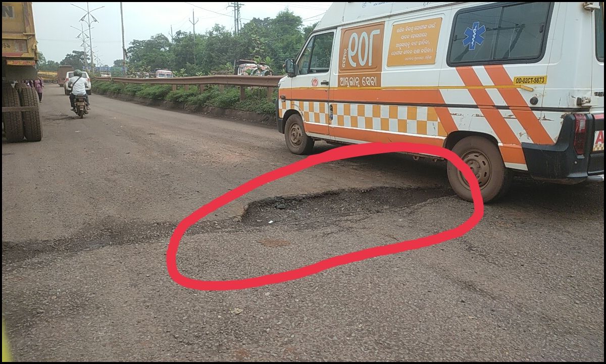 Potholes on the main road in the Barbil Municipality area